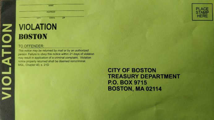 a green violation envelope