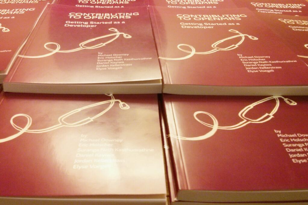 a stack of books with stethoscopes on the cover.